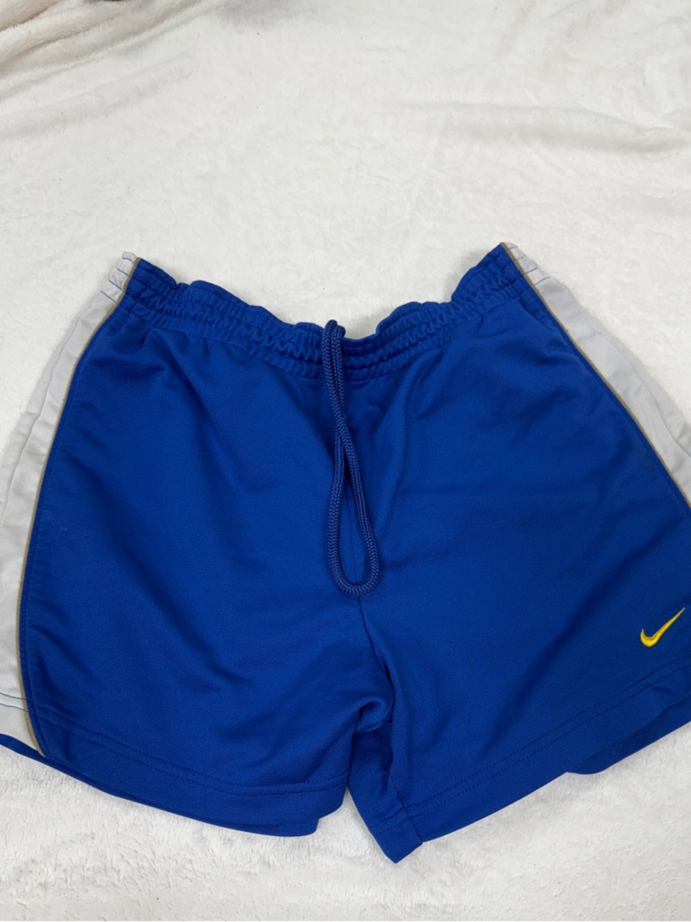 Nike Men’s Blue Athletic Shorts with Yellow Swoosh